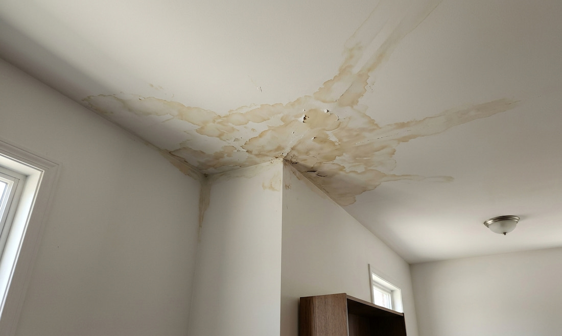 The interior ceiling of a residential home with roof leak