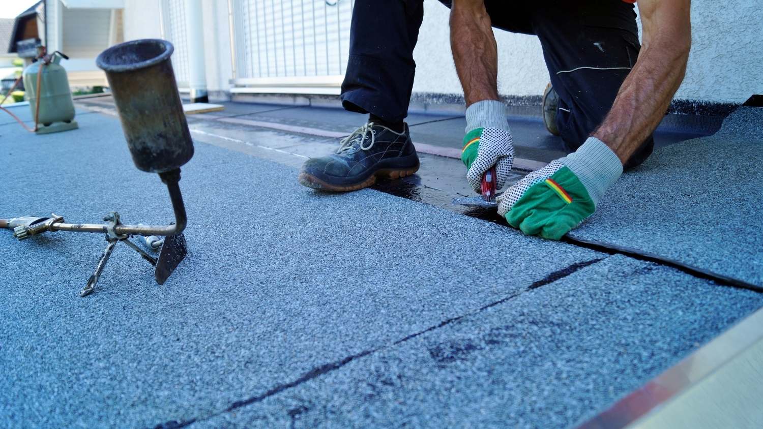 installing a torch-on bitumen waterproofing membrane