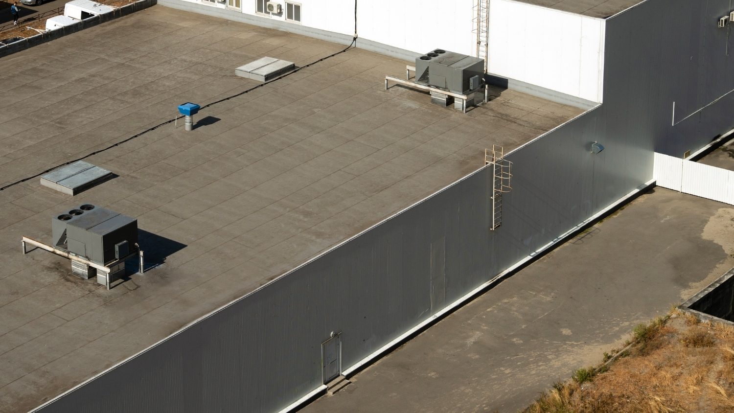 flat commercial roof on a large building