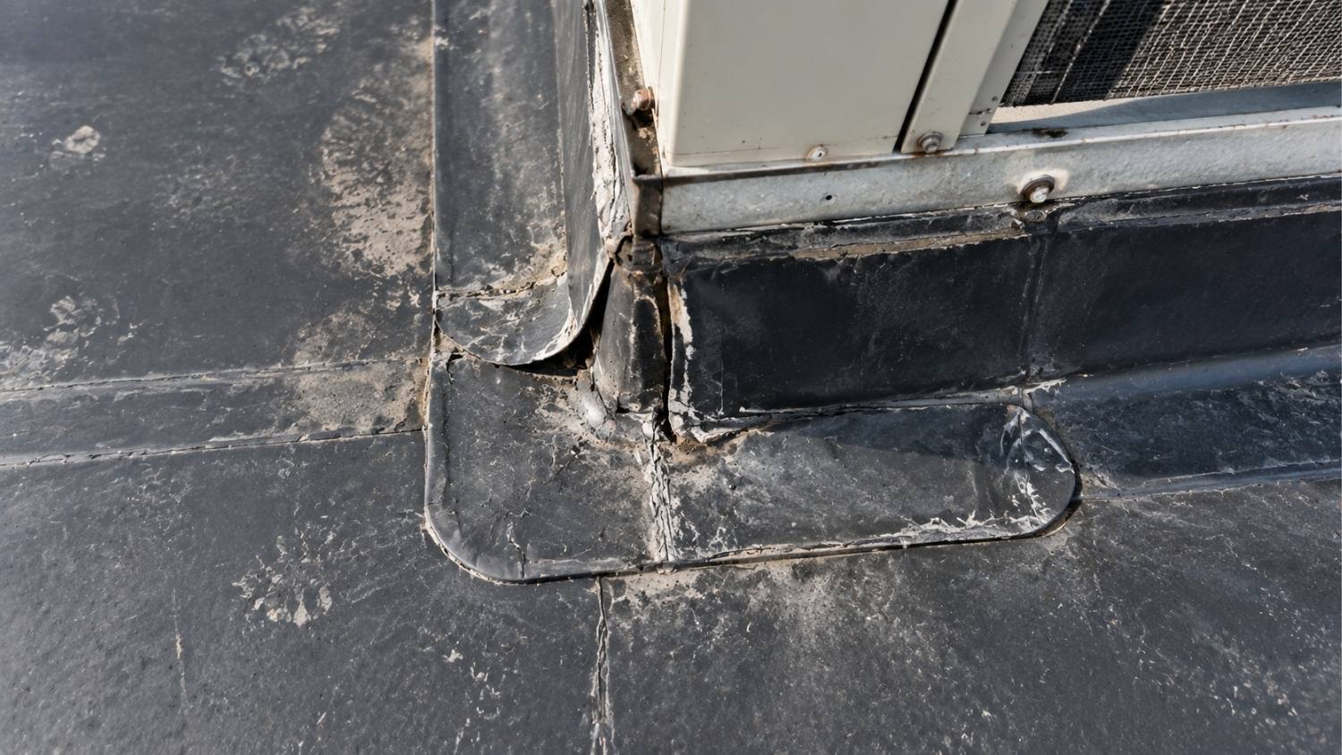 membrane around the curb shows a failing condition